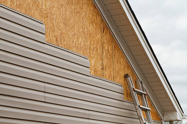 Professional Siding Repair technician working in Bay Shore, NY